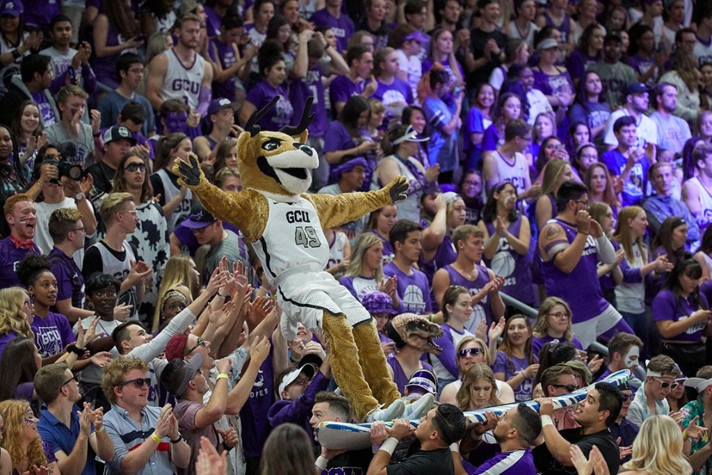 GCU Mascot Thunder in the students section crowd surfing at the GCU Arena