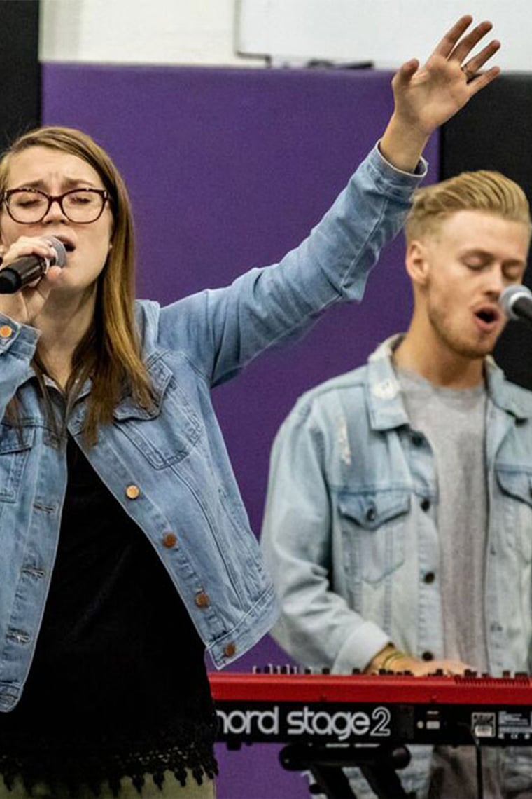 Two GCU Students singing at Canyon Worship