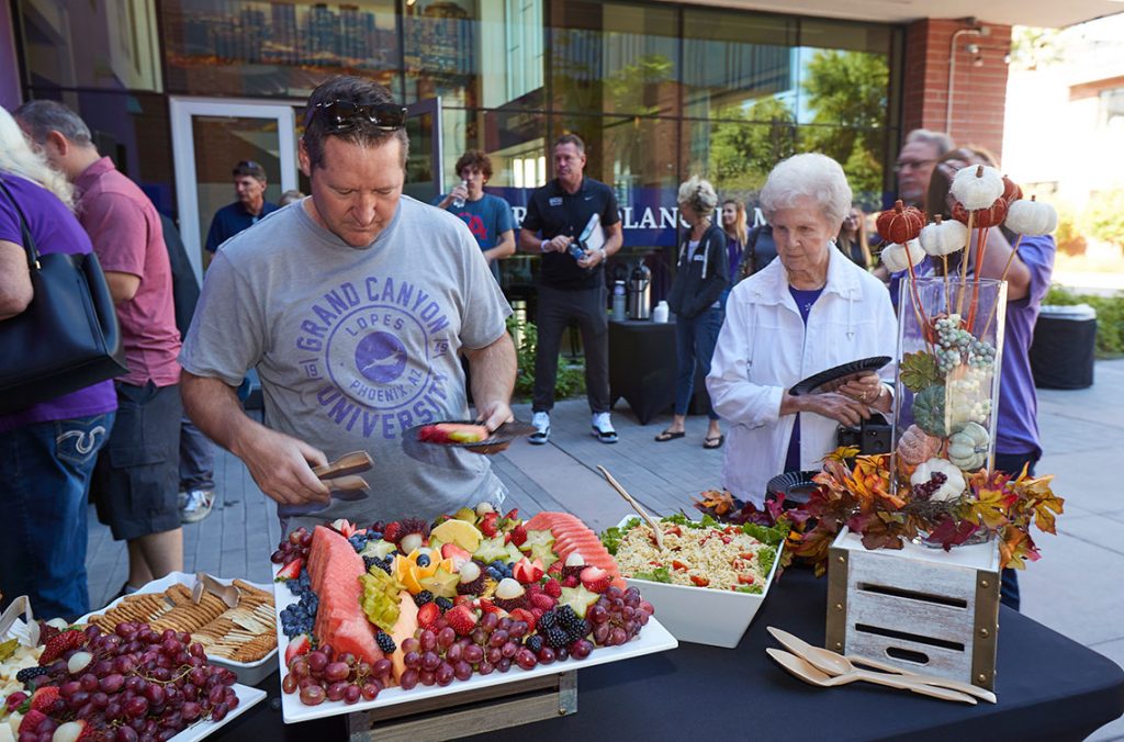 Lopes Club members in line for food